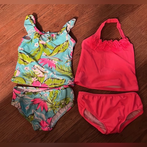 Bundle of 2 Carter’s, 2 piece Swimsuits, size 18 months  
Pink, blue - Picture 1 of 6